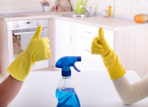 Cleaner using equipment safely during a cleaning job
