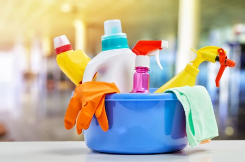 Cleaner responding carefully to a workplace hazard