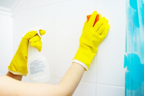 Professional deep cleaning in SW6 focusing on bathroom tiles, fixtures, and hard-to-reach areas