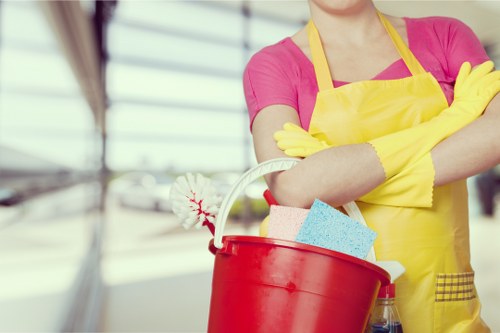 Detailed post-construction cleaning in a kitchen and living space in SW6